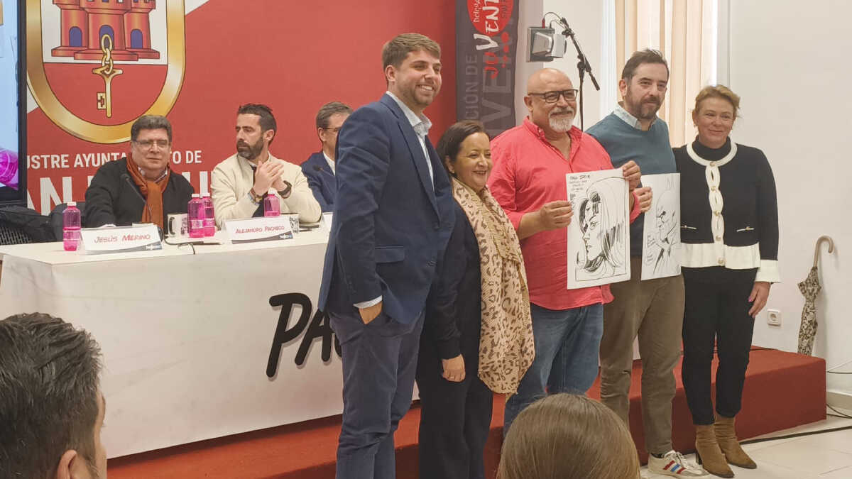 Jesús Merino y Álvaro Martínez con sus ilustraciones realizadas en directo